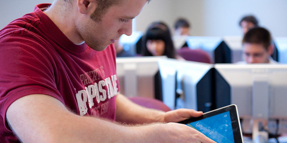 A student works on an iPad