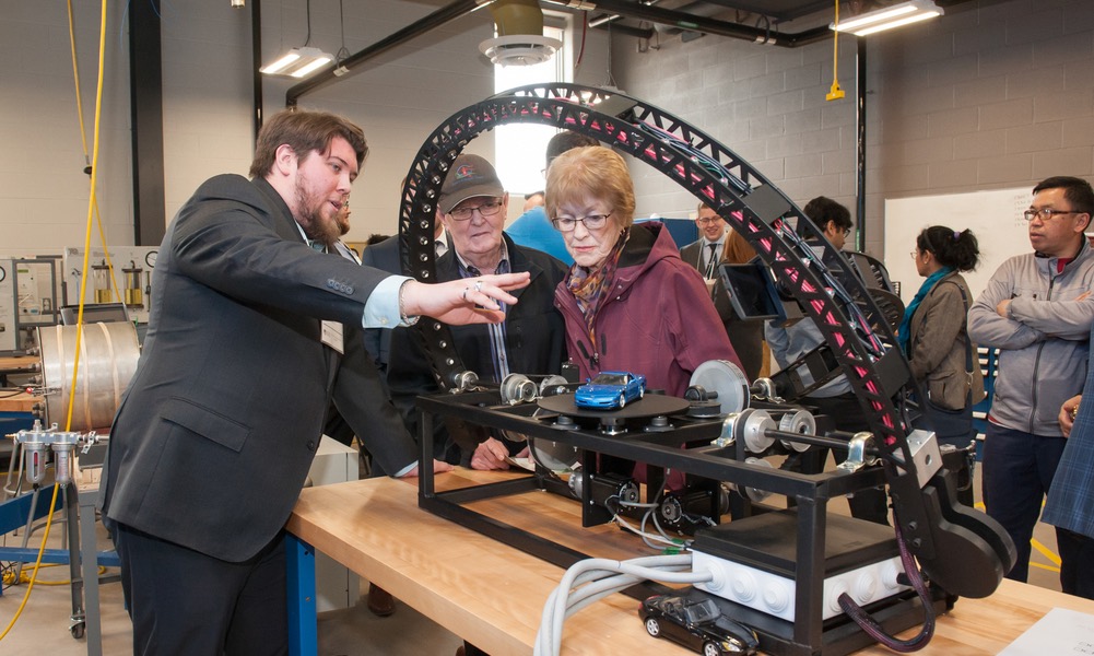 a student demonstrating a project 