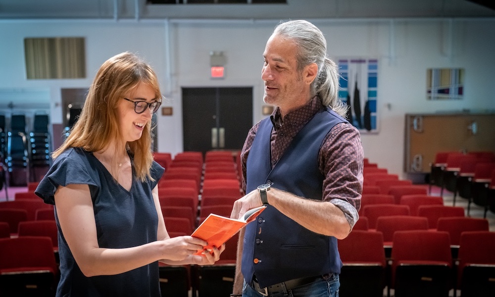 Dr. Greg Doran and a theatre studies student on stage