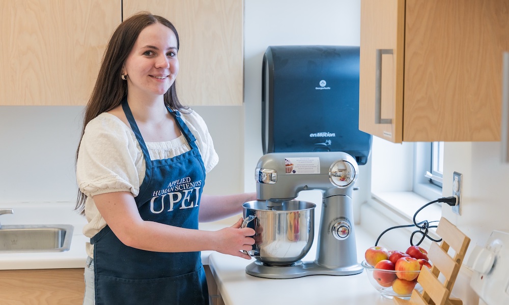 Foods and Nutrition student Olivia Wakelin in the Foods laboratory