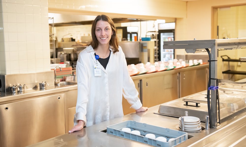 Katie Nordby working in the kitchen at the Mount Continuing Care Community