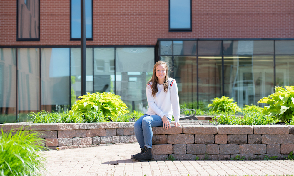 upei nursing graduate shayna conway outdoors in maclauchlan plaza 