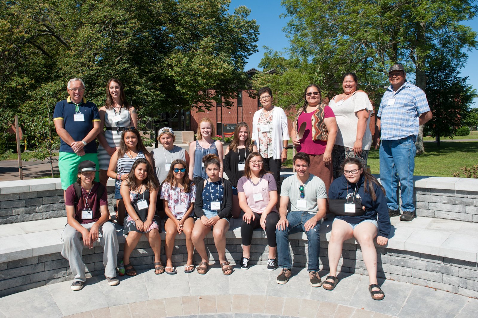 students sitting outside with Jenna Burke