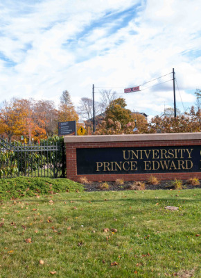 photo of sign in front of campus