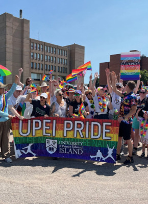 Photo of a group at the Pride Parade wearing colourful clothing