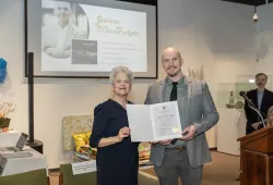 Dr. Joshua MacFadyen accepts award for his book. Photo: Government of Prince Edward Island 