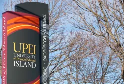 close up photo of the UPEI sign