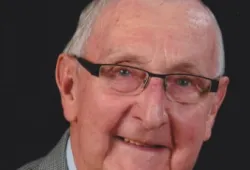 portrait photo of man wearing glasses