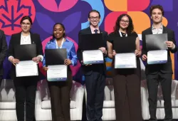 Five post-secondary students are presented with the second-annual Frank Saunders Memorial Awards for Nuclear Excellence on April 29 at the 2026 Canadian Nuclear Association Conference in Ottawa.   L-R: Pat Dalzell, Vice-President, Corporate Affairs and Market Development, Bruce Power; Tina Nazemzadeh, Western University; Kya Drummond, University of Calgary; Ethan Drake, University of Prince Edward Island; Amna Dahar, University of Calgary; Ethan Perlin, University of Calgary; Jessica Linthorne, President an