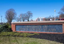photo of a sign at the campus entrance