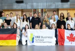 UPEI business professor Dr. Jürgen Krause (left) and Kevin Murphy CM, co-founder of the Murphy Hospitality Group (right) with university students and professors from EBZ Business School in Bochum, Germany, and UPEI.