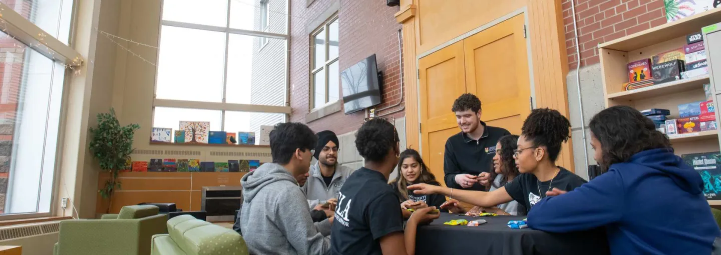 a group of students playing a board game