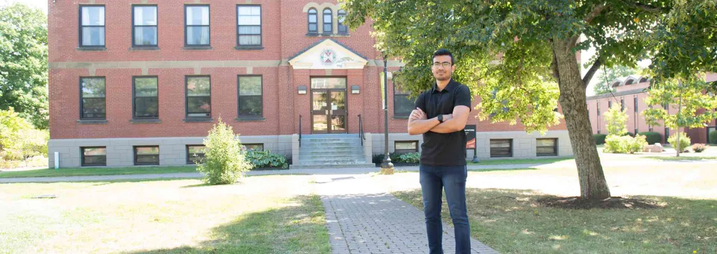 graduate student Aadesh Nunkoo in the UPEI quad