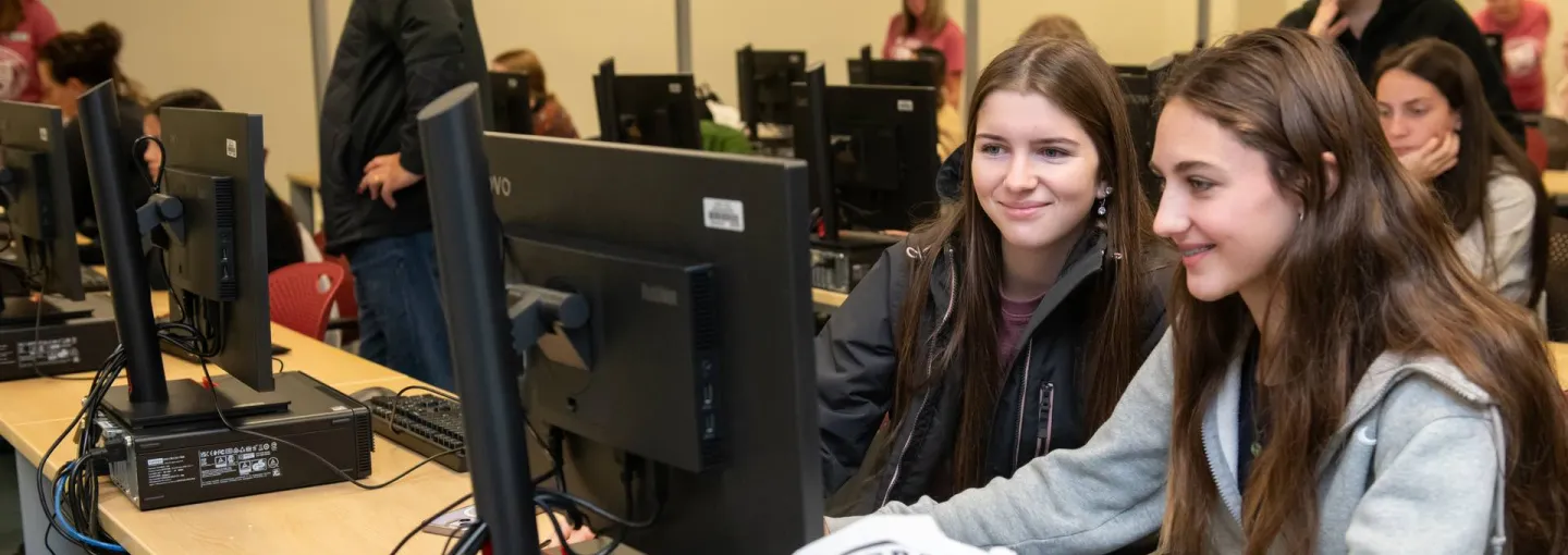 two students registering for classes