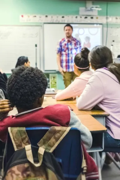 an elementary school classroom with a teacher and students