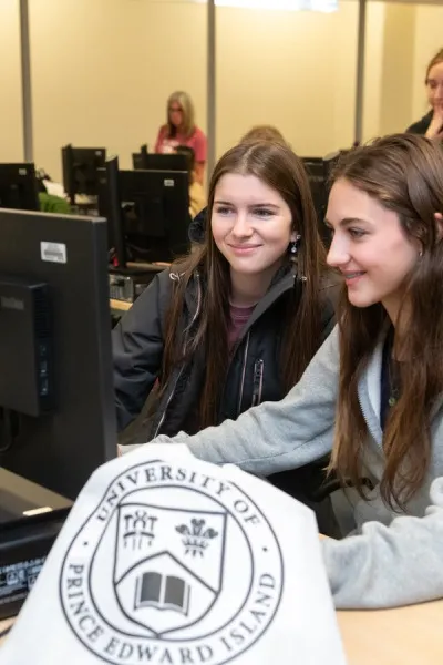 two students registering for classes