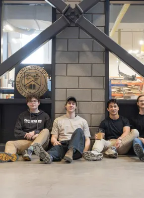 four engineering students in the Faculty of Sustainable Design Engineering building