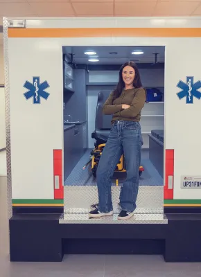 UPEI Paramedicine graduate Kellie MacLeod in a mock ambulance