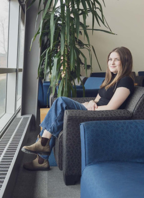 UPEI sociology graduate Andraya Gallant in the AVC Learning Commons