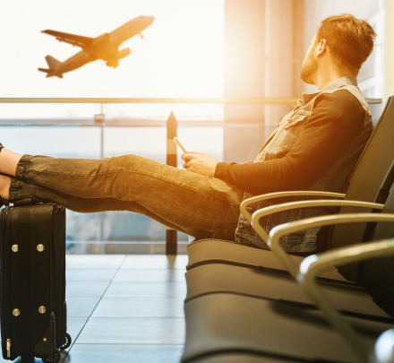 a traveller waiting for a flight