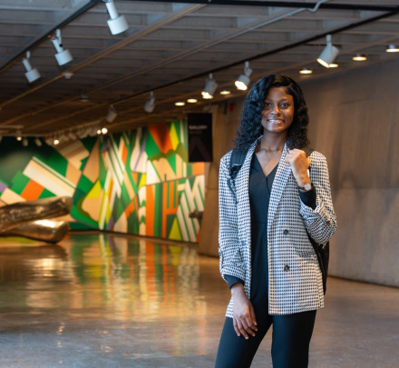 a person standing in an art gallery