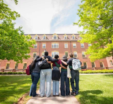 a group of students in front of SDU Main Building