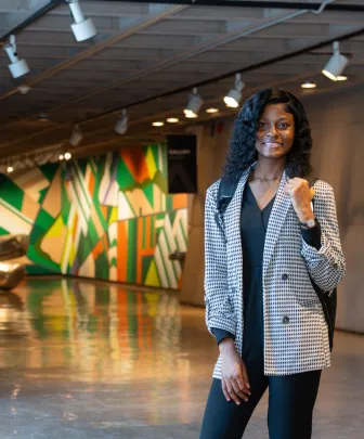 a person standing in an art gallery