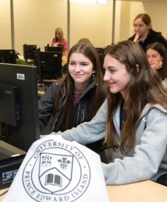 two students using a computer