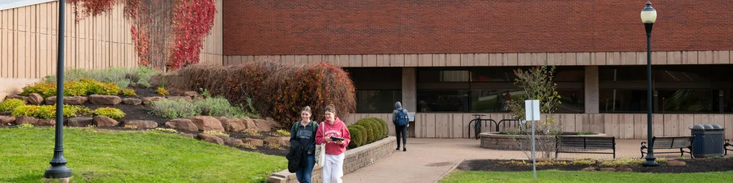 students walking outside Robertson Library