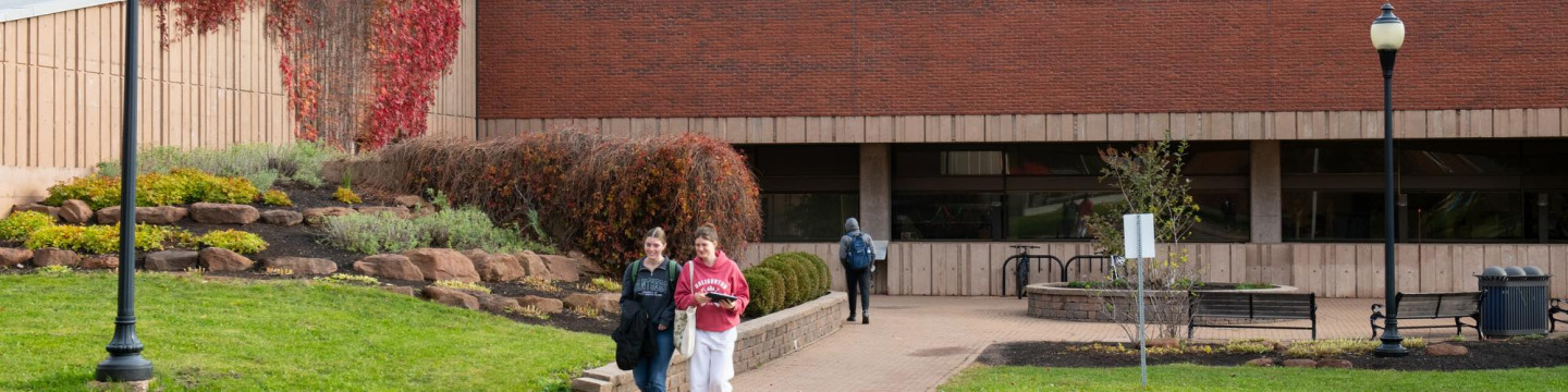 students walking outside Robertson Library