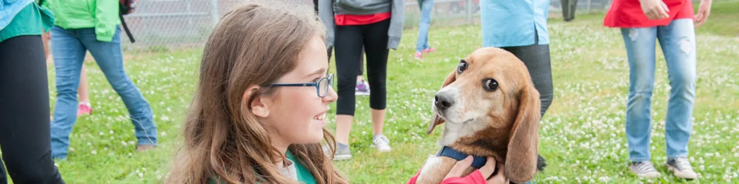 a Vet Camp participant and a beagle