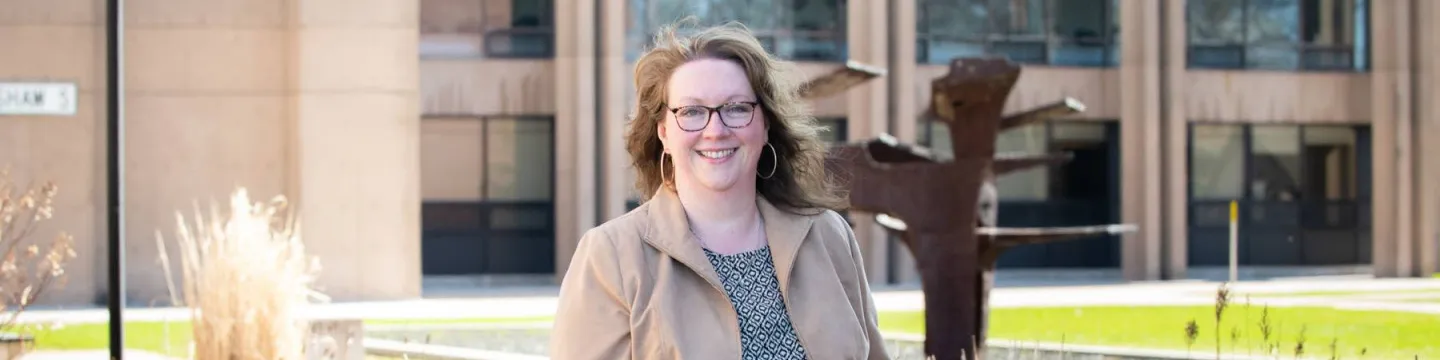 a person standing outside PEI's government offices