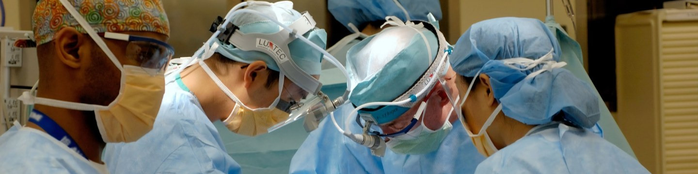 a group of five surgeons
