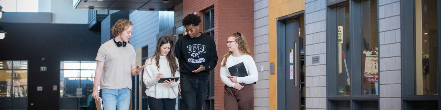 four engineering students in the Faculty of Sustainable Design Engineering building