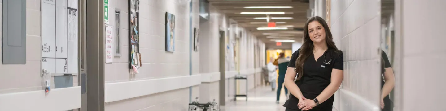 UPEI DVM student in the AVC hallway