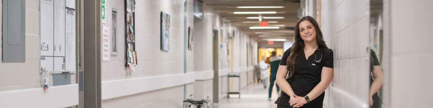 UPEI DVM student in the AVC hallway