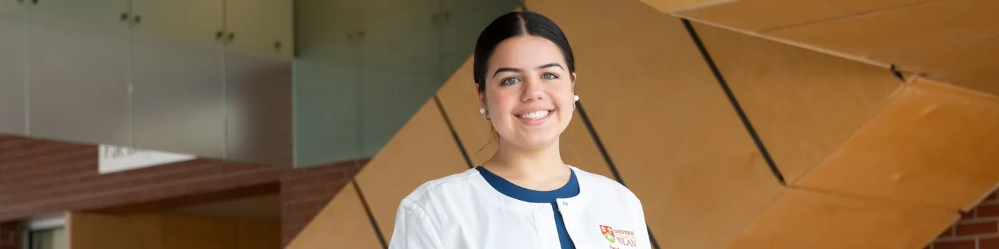 UPEI nursing student Mariana in the Applied Health Sciences building lobby