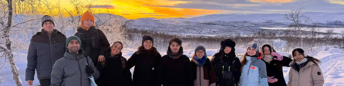 a group of students in Finland at sunset