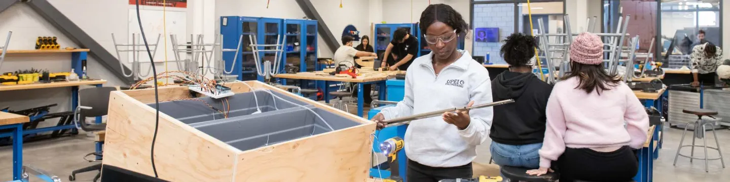 UPEI engineering student Rosetta Shokunbi working on a project in a lab