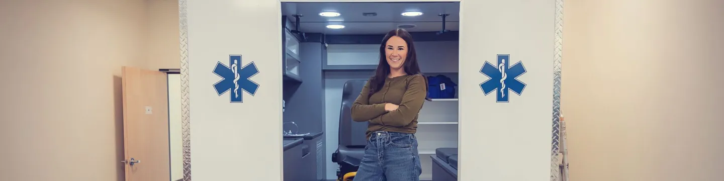 UPEI Paramedicine graduate Kellie MacLeod in a mock ambulance