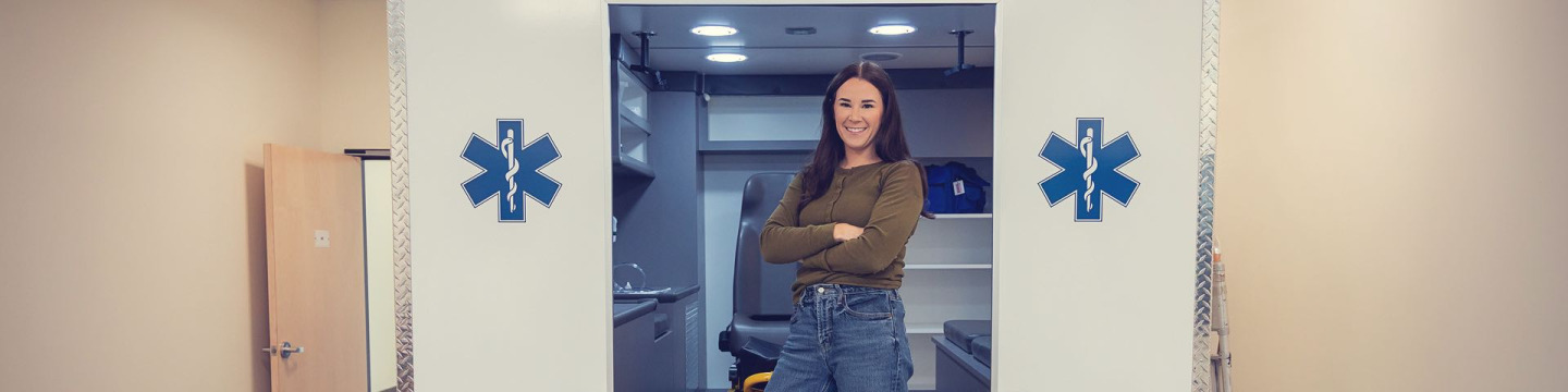 UPEI Paramedicine graduate Kellie MacLeod in a mock ambulance