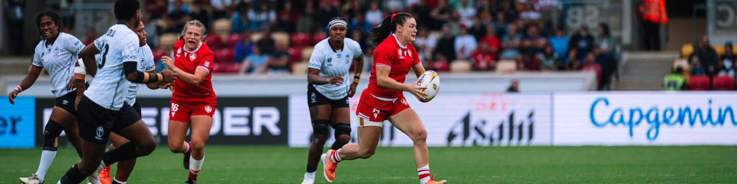 Team Canada Rugby athlete Alysha Corrigan running with a rugby ball