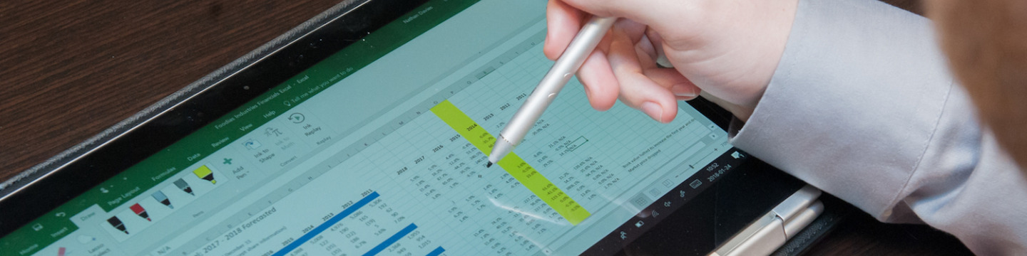a spreadsheet displayed on a tablet