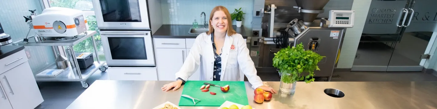 female food product developer in a kitchen