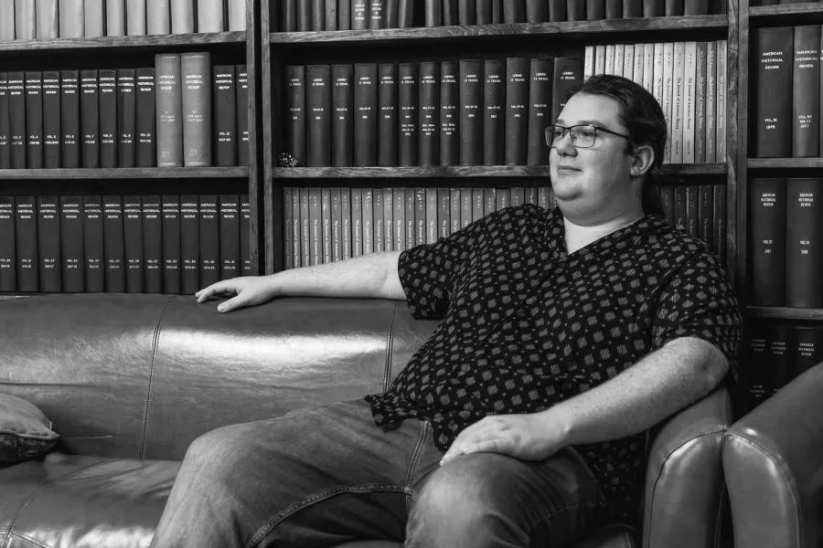 UPEI History student Riley Drake in the History student lounge