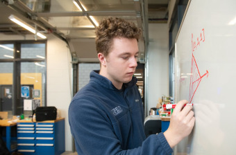 Sustainable Design Engineering student Jimmy Hulton working on a project