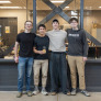 four engineering students in the Faculty of Sustainable Design Engineering building
