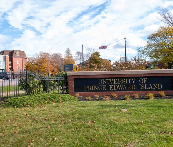 photo of sign in front of campus