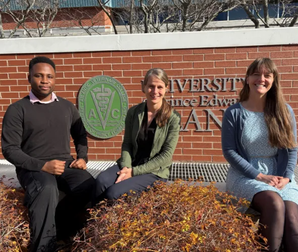 Tunmise Faith Ehigbor, Dr. Caroline Ritter, and  Dr. Katie Koralesky seated outdoors