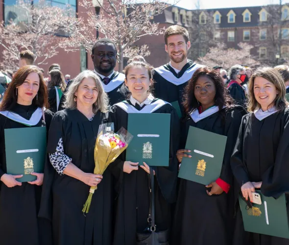 a group of six Master of Arts in Island Studies graduates at UPEI Convocation